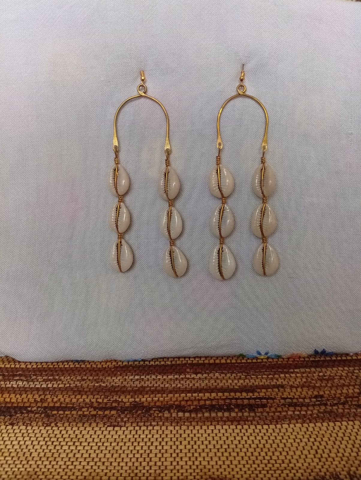Brass cowrie shell earrings